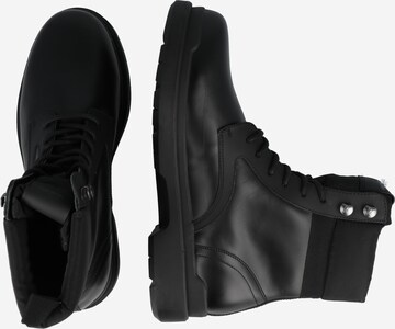 Calvin Klein Lace-Up Boots in Black