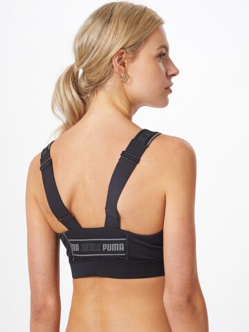 PUMA Bustier Sport bh in Zwart