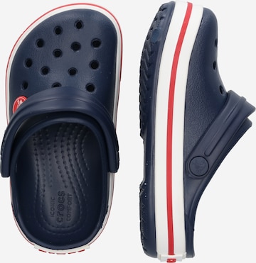 Pantofi deschiși de la Crocs pe albastru