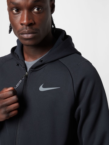 NIKE Outdoor jacket in Black