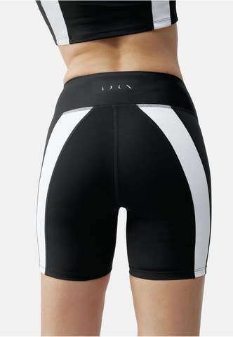 Born Living Yoga Skinny Sporthose 'Bindi' in Schwarz