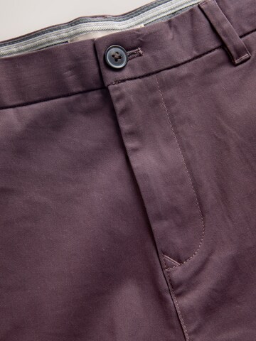 Next Slimfit Chinohousut värissä lila