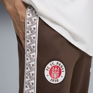 PUMA Tapered Sports trousers 'FC St. Pauli King Anthem' in Brown