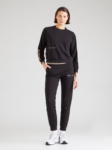 Tuta da jogging 'NATURAL VENTUS7' di EA7 Emporio Armani in nero: frontale