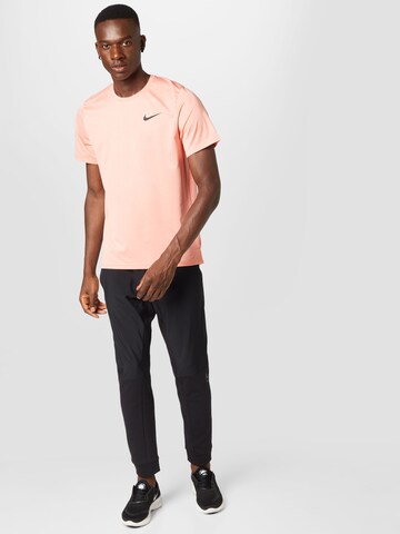 NIKE Performance Shirt 'Pro' in Orange