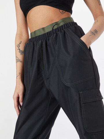 Reebok Tapered Broek in Zwart