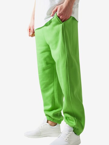 Tapered Pantaloni di Urban Classics in verde: frontale