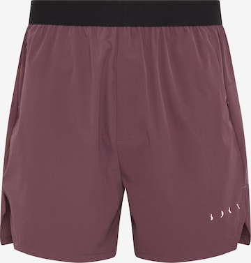 Pantalon ' Malaui ' Born Living Yoga en rouge : devant