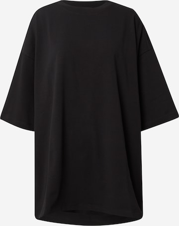 Karo Kauer Oversized bluse i sort: forside