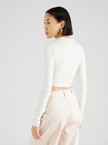 Pull-over Calvin Klein Jeans en blanc