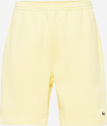 LACOSTE Trousers in Yellow: front