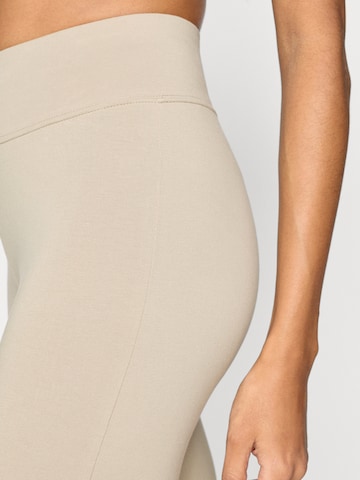 Evazați Pantaloni sport de la Champion Authentic Athletic Apparel pe bej