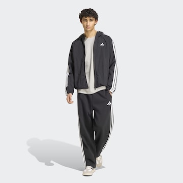 Loosefit Pantaloni sportivi di ADIDAS SPORTSWEAR in nero