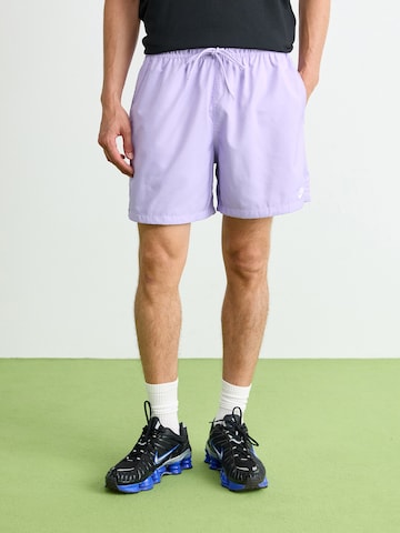 Nike Sportswear Loose fit Trousers 'CLUB' in Purple: front