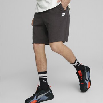 PUMA Loose fit Pants in Black: front