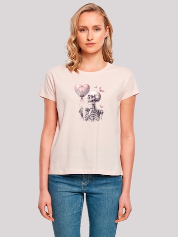 T-shirt 'Skelett hält Herzballon' F4NT4STIC en rose : devant