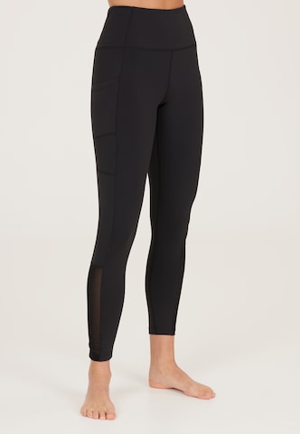 Athlecia Skinny Workout Pants 'Elli' in Black