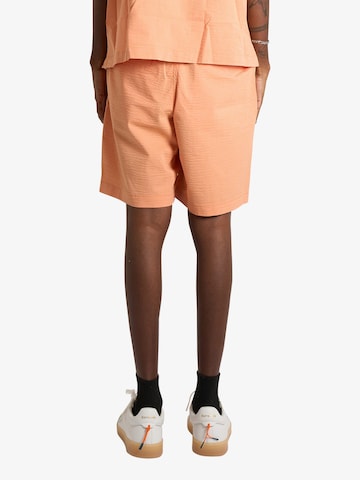 LACOSTE Regular Pants in Orange