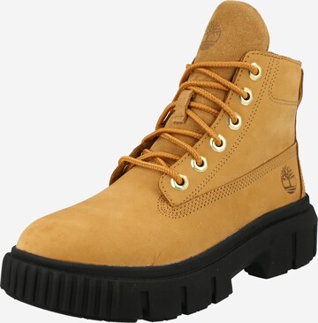 TIMBERLAND - Botim com fivela em castanho: frente