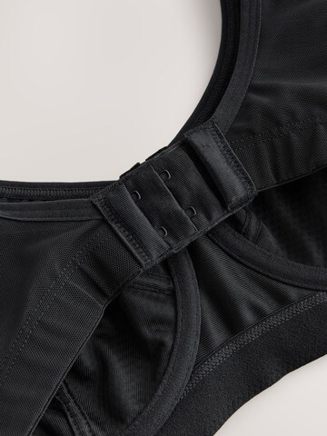 Invisible Soutien-gorge de sport Next en noir