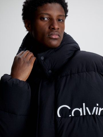 Calvin Klein Jeans Overgangsfrakke 'ESSENTIALS' i sort
