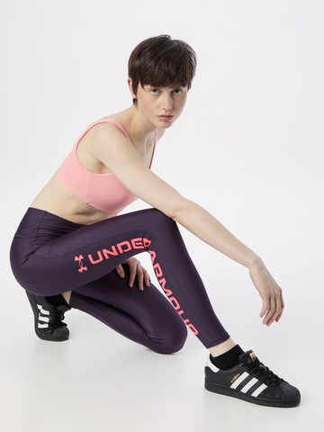 Skinny Pantaloni sportivi di UNDER ARMOUR in lilla