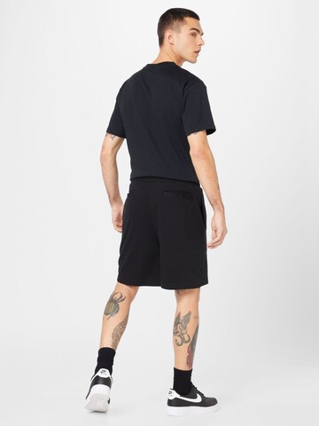 Karl Kani Regular Pants in Black