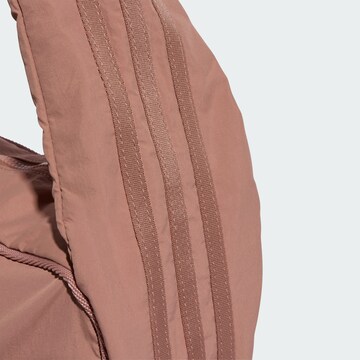 ADIDAS ORIGINALS Axelremsväska i rosa