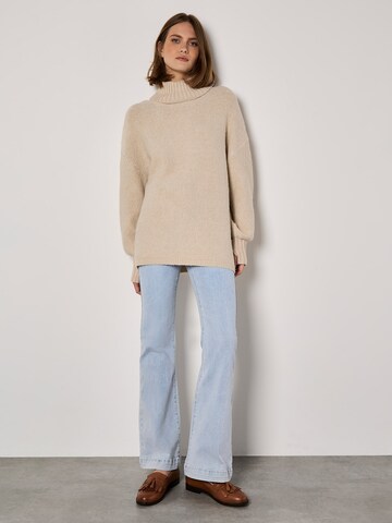 Pull-over ' ' Apricot en gris