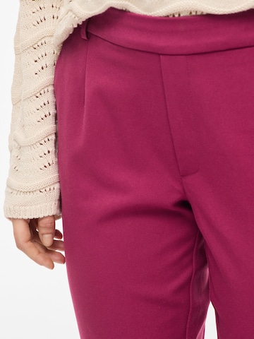 VILA Ozke Hlače z naborki 'VIVARONE' | rdeča barva