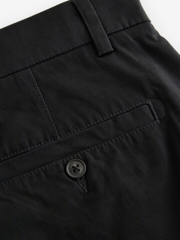 Next Loose fit Chino trousers in Black