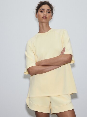 Next - Camisa em amarelo: frente