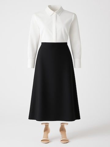 Touche Prive Skirt in Black: front
