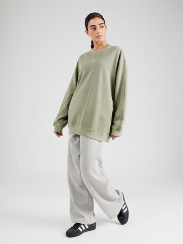 ADIDAS ORIGINALSSweater majica 'Ess' - zelena boja