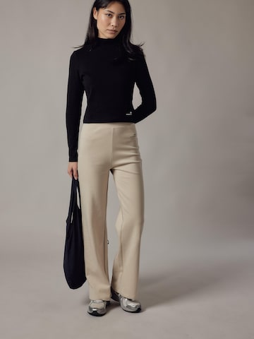 Flared Pantaloni 'Panta Palazzo in Interlock' di OWN Off With Nature in beige: frontale