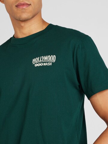 HOLLISTER Μπλουζάκι 'AMERICAN DESTINATIONS' σε πράσινο