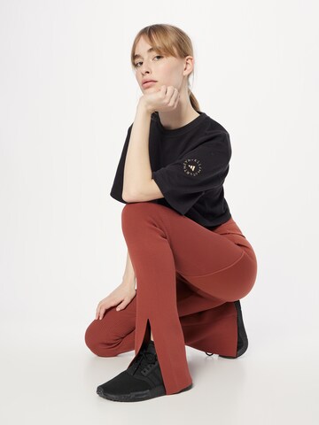 évasé Pantalon de sport 'Truestrength ' ADIDAS BY STELLA MCCARTNEY en marron