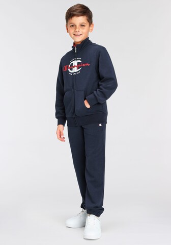 Champion Authentic Athletic Apparel Tracksuit in Blue: front