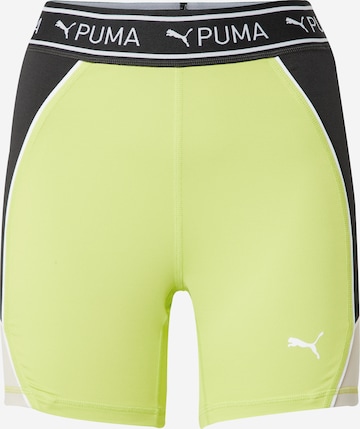 PUMA Skinny Spodnie sportowe 'TRAIN STRONG 5' w kolorze zielony: przód