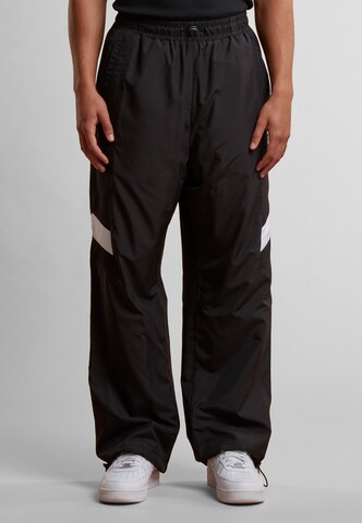 Baggy Pantaloni di Starter Black Label in nero
