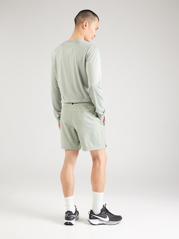 regular Pantaloni sportivi 'FLEX REP 4.0' di NIKE in verde