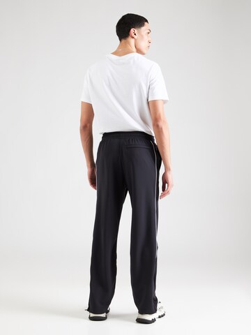 UNDER ARMOUR Loosefit Sportsbukser i sort