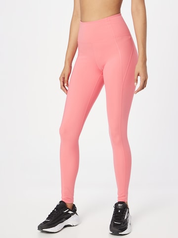 Girlfriend Collective Skinny Workout Pants in Pink: front