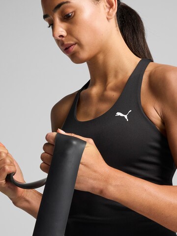 Top sportivo ' TAD ESSENTIAL' di PUMA in nero