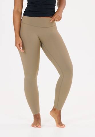Athlecia Skinny Sports trousers 'Emarri' in Brown: front