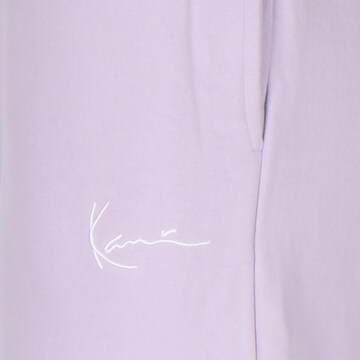 Karl Kani Loose fit Pants in Purple