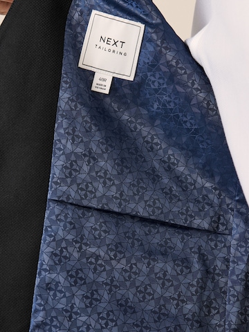 Next Vesta k obleku – černá