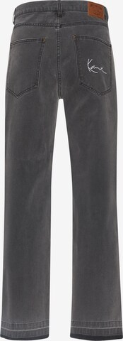 Karl Kani Bootcut Jeans in Grau