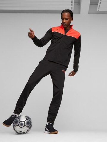 Ghete de fotbal 'King Top' de la PUMA pe negru