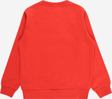 Champion Authentic Athletic Apparel Sweatshirt in Red